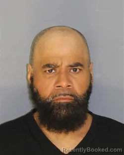 Mugshot of ORLANDO SANTOS booked in Essex County, New Jersey on March 24, 2026