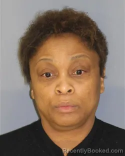 Mugshot of ANDREA MOORE booked in Essex County, New Jersey on March 31, 2026