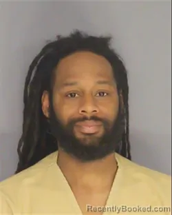 Mugshot of CHARLES L SIMMONS