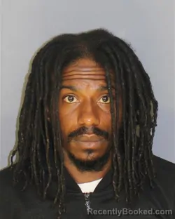 Mugshot of DANDRE R WALKER booked in Essex County, New Jersey on May 11, 2026