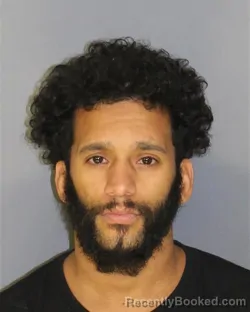 Mugshot of ALGENIS COTRICH booked in Essex County, New Jersey on July 11, 2026
