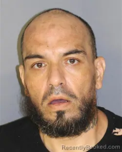 Mugshot of Juan Flores booked in Essex County, New Jersey on August 19, 2026