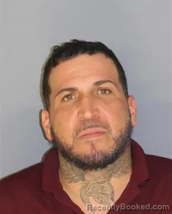 Mugshot of Hector Reyes booked in Essex County, New Jersey on August 21, 2026