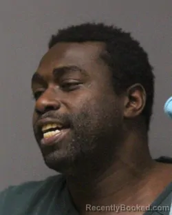 Mugshot of MOSES ELIJAH SUTTON