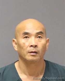 Mugshot of REN XIN HUANG booked in Ocean County, New Jersey on June 2, 2026