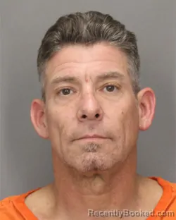 Mugshot of CHRISTOPHER DOTO