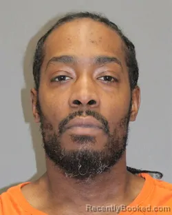 Mugshot of CORNEILUS R WOODS