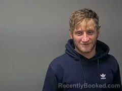 Mugshot of JONATHAN L MAGIS