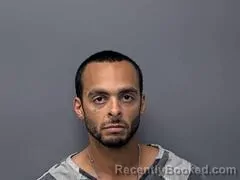 Mugshot of CLAYTON E HATCHET