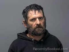 Mugshot of JUSTIN M SWEET