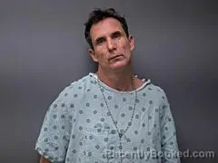 Mugshot of ANDREW J MELVIN