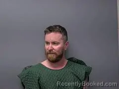 Mugshot of TYLER D HUDSON