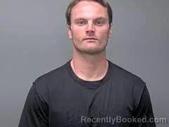 Mugshot of MATTHEW M JONES