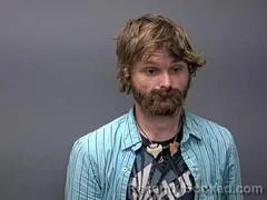 Mugshot of JAMES L COX booked in Baxter County, Arkansas on April 3, 2026