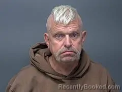 Mugshot of RAYMOND E BENNETT booked in Baxter County, Arkansas on April 20, 2026