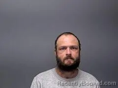 Mugshot of JAMES L SNURR booked in Baxter County, Arkansas on May 13, 2026