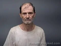 Mugshot of DOYLE G GEORGE booked in Baxter County, Arkansas on July 10, 2026
