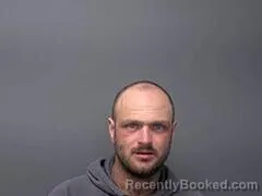 Mugshot of JAMES L SNURR booked in Baxter County, Arkansas on July 13, 2026