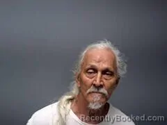Mugshot of James J Holmesly booked in Baxter County, Arkansas on August 9, 2026