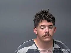 Mugshot of John C Hill booked in Baxter County, Arkansas on August 12, 2026