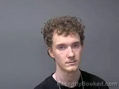 Mugshot of Jaryn L Racine booked in Baxter County, Arkansas on August 25, 2026