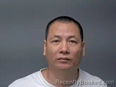 Mugshot of Meiming Wu booked in Baxter County, Arkansas on August 31, 2026