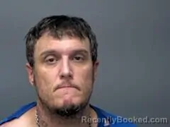 Mugshot of Michael J Warnock booked in Baxter County, Arkansas on August 31, 2026