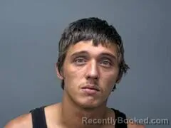 Mugshot of Derin D Dusch booked in Baxter County, Arkansas on October 4, 2026