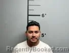 Mugshot of Jonathan Martinez-Romero booked in Benton County, Arkansas on May 12, 2026