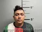 Mugshot of Julian Cruz-Guzman booked in Benton County, Arkansas on May 13, 2026