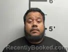 Mugshot of Peiat Peter booked in Benton County, Arkansas on May 13, 2026