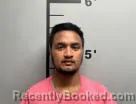 Mugshot of Heran Jilak booked in Benton County, Arkansas on May 15, 2026