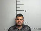 Mugshot of Juvenal Pacheco-Garcia booked in Benton County, Arkansas on May 25, 2026