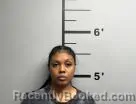 Mugshot of Genesis Thomas booked in Benton County, Arkansas on May 25, 2026