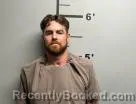Mugshot of Dustin Hartley booked in Benton County, Arkansas on May 25, 2026