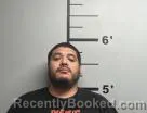 Mugshot of Rigoberto Jr Fernandez booked in Benton County, Arkansas on May 26, 2026