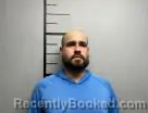 Mugshot of Carlos Ortiz booked in Benton County, Arkansas on June 1, 2026