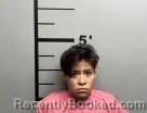 Mugshot of Adonna Garcia-Moreno booked in Benton County, Arkansas on June 1, 2026