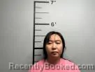 Mugshot of Zhu Wang booked in Benton County, Arkansas on June 4, 2026