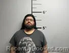 Mugshot of Adan Garcia Melchor-Garcia booked in Benton County, Arkansas on June 12, 2026