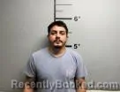 Mugshot of Carlos Jr Torres booked in Benton County, Arkansas on June 13, 2026