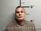 Booking photo from Benton County, Arkansas