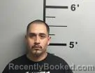 Mugshot of Nestor Correa booked in Benton County, Arkansas on June 16, 2026