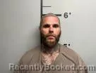 Mugshot of Lucas Stoops booked in Benton County, Arkansas on June 19, 2026
