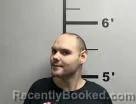 Mugshot of Corbin Huskey booked in Benton County, Arkansas on July 2, 2026