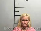 Mugshot of Kori Burkett booked in Benton County, Arkansas on July 4, 2026