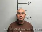 Mugshot of Salvador Pozos-Rios booked in Benton County, Arkansas on July 5, 2026
