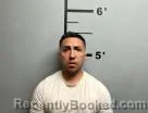 Mugshot of Juan Beltran booked in Benton County, Arkansas on July 6, 2026