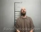 Mugshot of Caleb Woods booked in Benton County, Arkansas on July 8, 2026