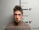 Mugshot of Austin Treat booked in Benton County, Arkansas on July 8, 2026